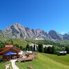 Starting from the mountain station, we walk past the Odles mountain hut, along the trail n&deg;4. In the background the Odle mountain peaks with Fermeda and Sass Rigais - Foto: AT, &copy; Peer
